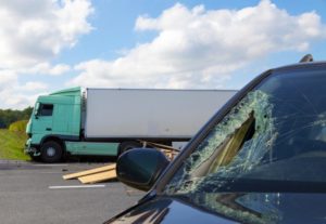 Image of Semi and car crash