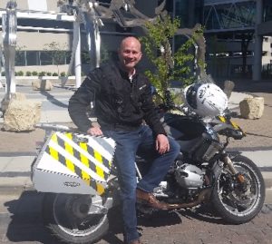 Image of man on a motorcycle