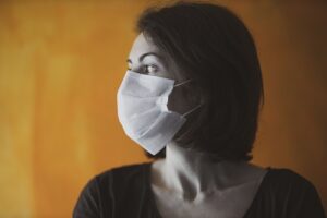 Image of woman wearing a mask