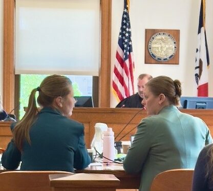 Iowa attorneys Emily Anderson and Laura Schultes during trial.